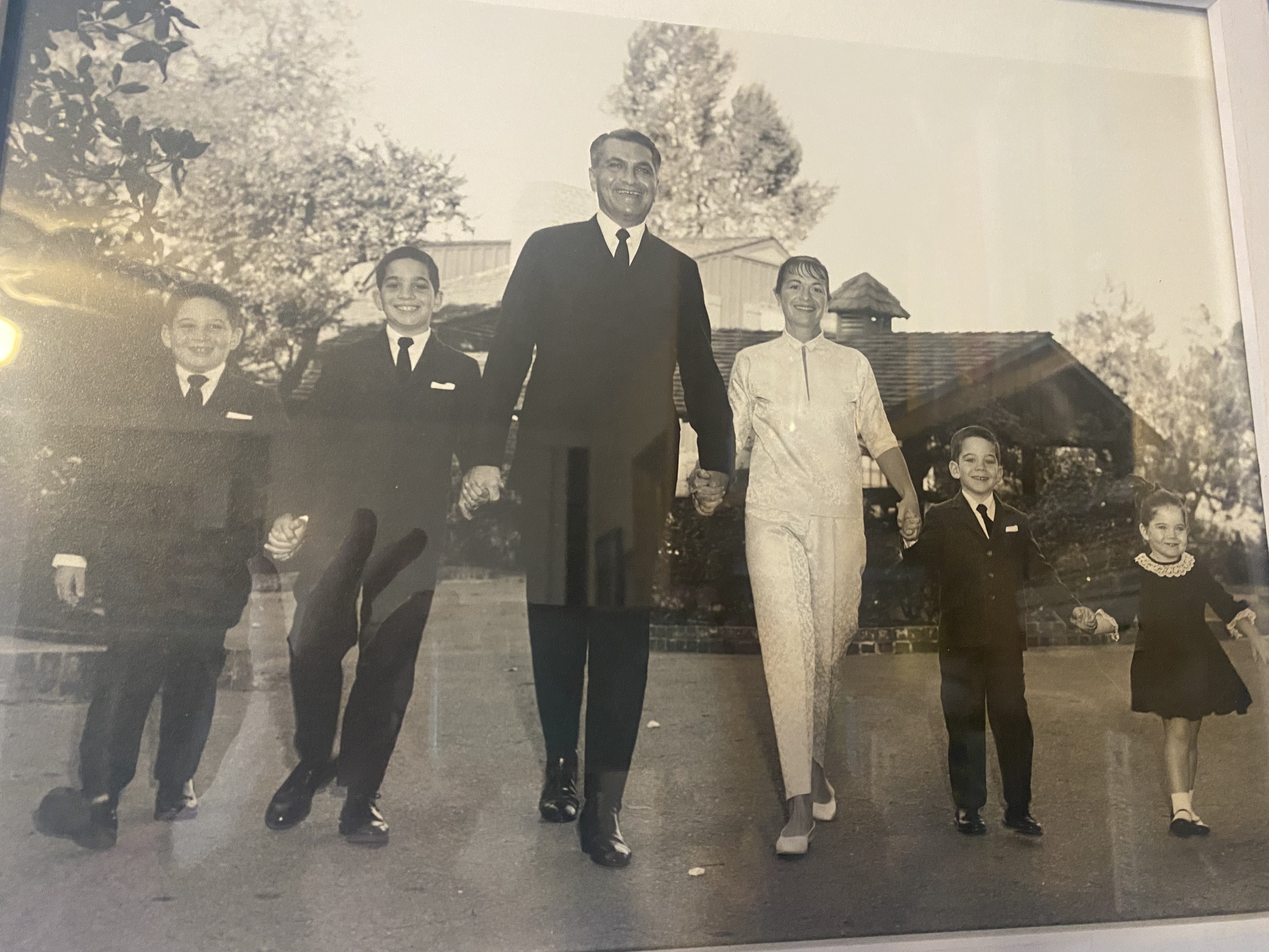 Patty and Family Walking in front of Encino homestead, Four Oaks Farm